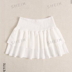 SHEIN white layered ruffle skirt.